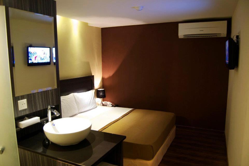 Zotel Business & Leisure Hotel Kuching Phòng bức ảnh